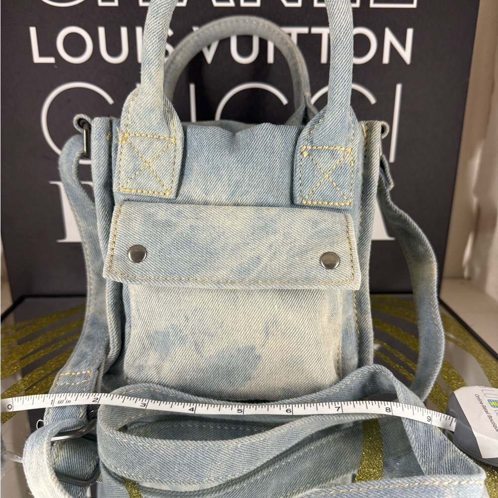 Blue Mini Bag with Detachable Strap and Structured Design